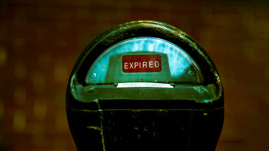 An expired old-style parking meter.